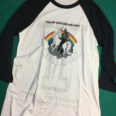 Mad Hanna softball tee shirt with Mr. T riding a unicorn under a rainbow