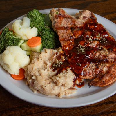 Bone In Bourbon Pork Ribeye