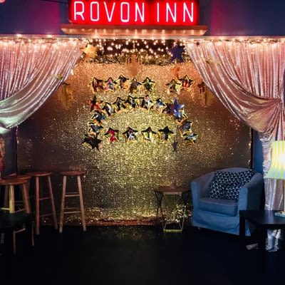 Interior, shiny wall with stars in the back