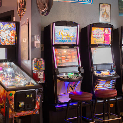 Pinball machine and Oregon Video Lottery terminals at Mad Hanna