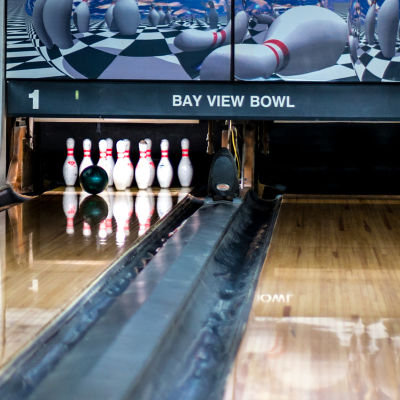Bowling lane with pins.