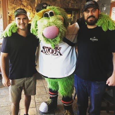 Storm Stadium mascot posing with staff