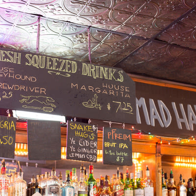 Chalkboard menu of fresh squeezed drinks at Mad Hanna