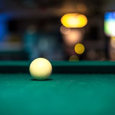 Cue ball on the pool table.
