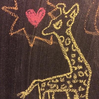 A drawing of a giraffe on the blackboard