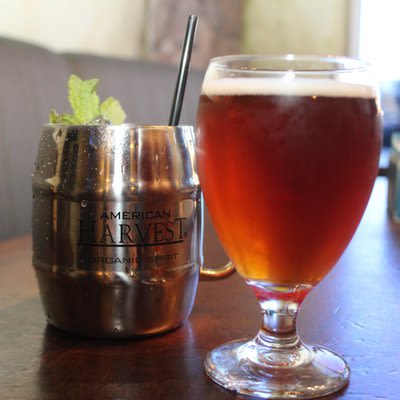 Moscow mule cocktail and a glass of beer